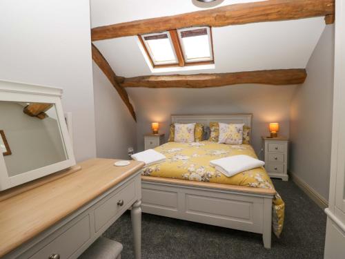Postel nebo postele na pokoji v ubytování Yeat Stoup Cottage