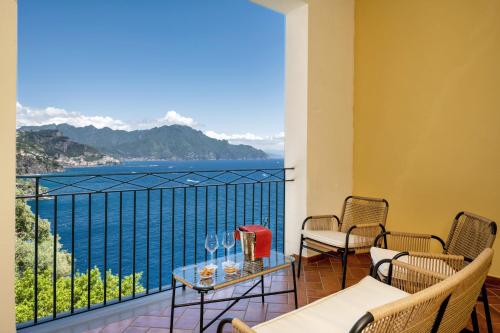 a balcony with a view of the ocean at Hotel Belvedere in Conca dei Marini