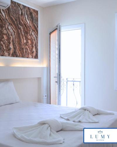 Ένα ή περισσότερα κρεβάτια σε δωμάτιο στο Bodrum Eskiçeşme Lumy Hotel - Private Pool