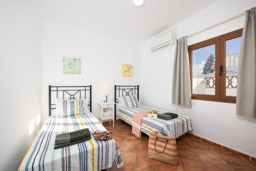 Postel nebo postele na pokoji v ubytování Villa Thomas