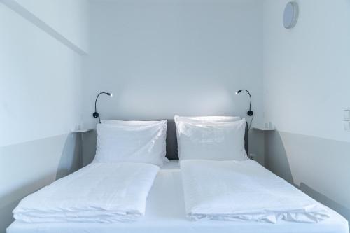 Cama o camas de una habitación en Comfort Collection Podersdorf am See