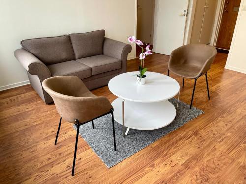 Ruang duduk di Säffle Suites by Svaneholm Hotel