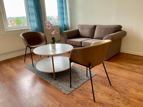 Ruang duduk di Säffle Suites by Svaneholm Hotel