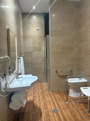 Ένα μπάνιο στο Apartahotel Punta Calera