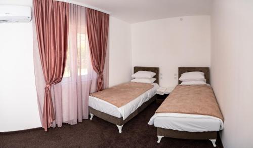Cama o camas de una habitación en Villa Palma - With Free Parking