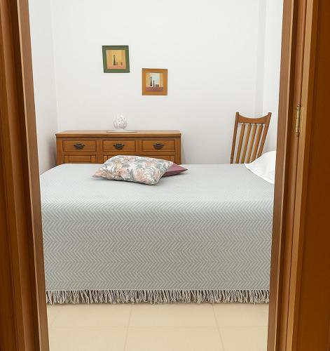 Ένα ή περισσότερα κρεβάτια σε δωμάτιο στο AurEdo Apartment