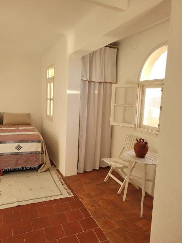 Ένα ή περισσότερα κρεβάτια σε δωμάτιο στο Villa Calypso