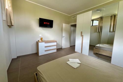 Katil atau katil-katil dalam bilik di Romanino House Mountain Lake Iseo Hospitality