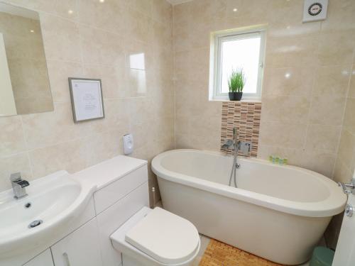 Et badeværelse på James Ville Marina Lodge 22