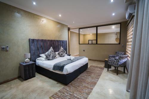 Katil atau katil-katil dalam bilik di Humdani Game Lodge