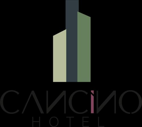 a white and green logo on a black background at Hotel Cancino in Comitán de Domínguez