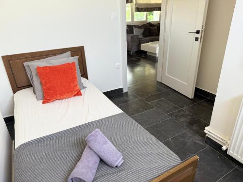 Katil atau katil-katil dalam bilik di AVS Holiday Home