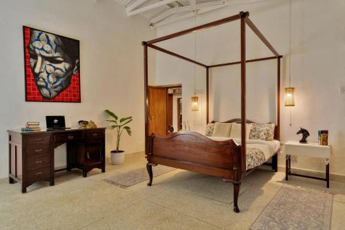 Postel nebo postele na pokoji v ubytování SaffronStays Nandanvan Estate, Kodaikanal