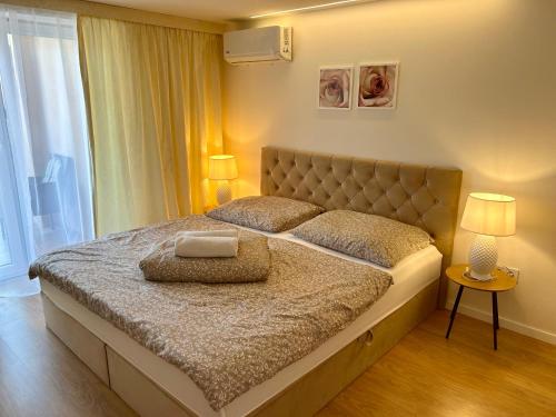 Katil atau katil-katil dalam bilik di Apartments ZARA