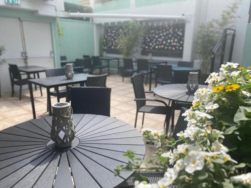 a table with an umbrella sitting on top of it at The Newgrange Hotel in Navan