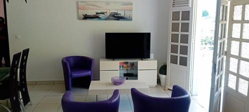 Televisyen dan/atau pusat hiburan di appartement glicéria