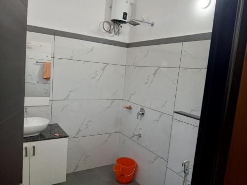 Ένα μπάνιο στο Tharavadu Home Stay, Wayanad