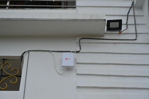 a box on the side of a building at Rudra Homes in Guwahati