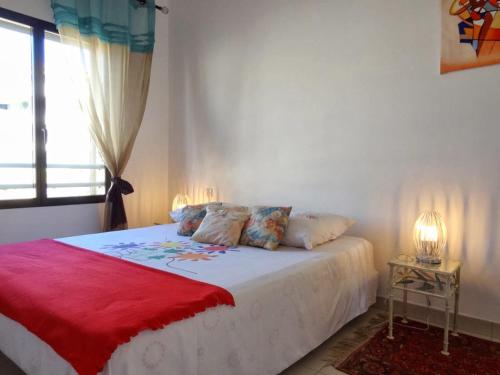 Säng eller sängar i ett rum på Appartement Vue Mer Corse Sud