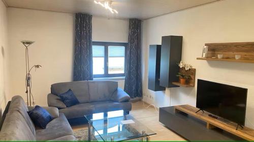 Posezení v ubytování Gemütliche Ferienwohnung in Ockenheim