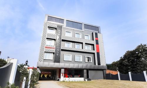 a rendering of the front of a building at Super Townhouse Prithvi Resort Near Phoenix Palassio in Lucknow