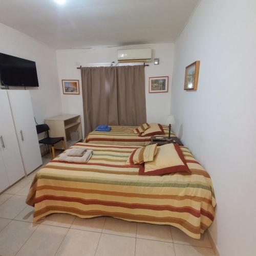 Ένα ή περισσότερα κρεβάτια σε δωμάτιο στο Apartamento A