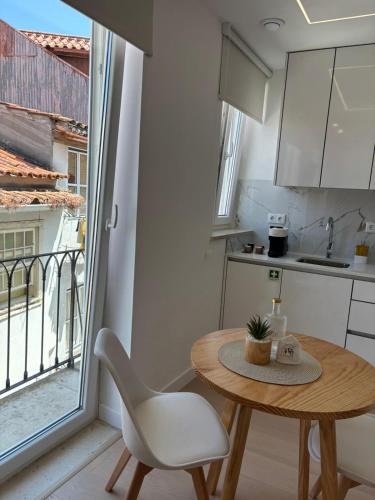 Kuchyň nebo kuchyňský kout v ubytování VC House Estúdios, Coimbra