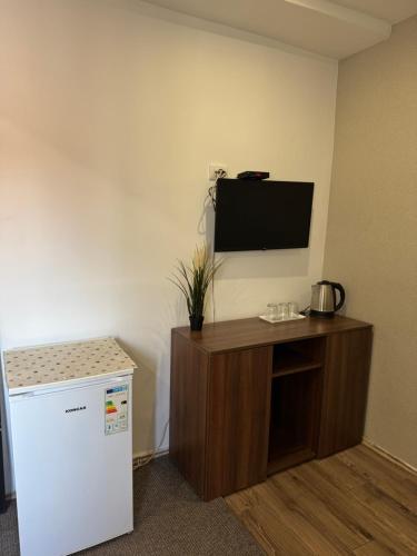 Kuchyň nebo kuchyňský kout v ubytování Apartments and Rooms L E F T RIVER Belgrade