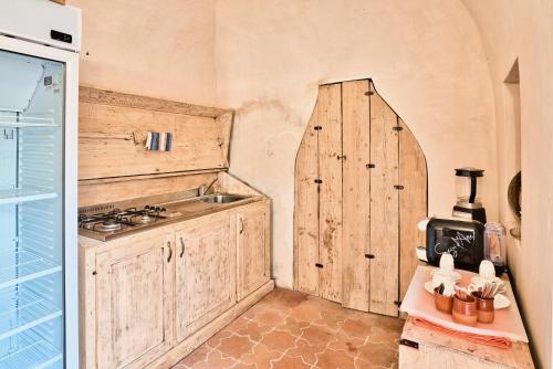 Kuchyň nebo kuchyňský kout v ubytování Il Saracino boutique suites