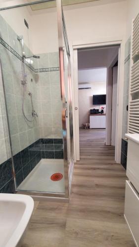 a bathroom with a shower and a sink at La Casa di Perla BILOCALE A 6 Kilometri da SALO' in Villanuova sul clisi