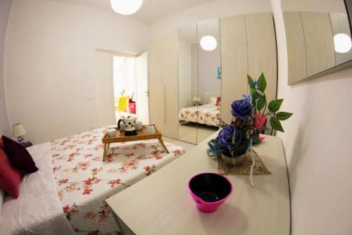 Ένα ή περισσότερα κρεβάτια σε δωμάτιο στο Casa Vacanze Aurora