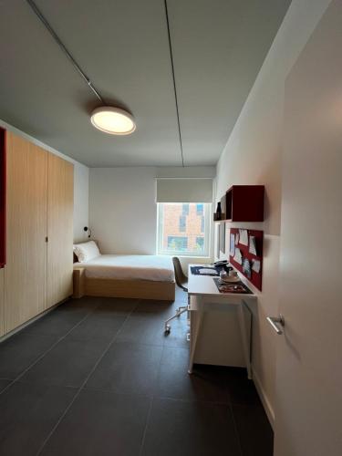 Postel nebo postele na pokoji v ubytování aparto Milan Durando