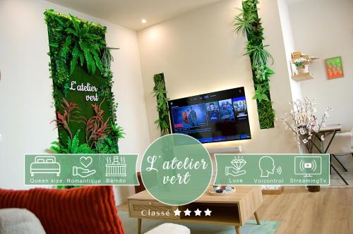 a living room with plants on the walls at L'atelier vert - Suite Luxe, SPA, Proche Hypercentre - Classé 4 étoiles in Troyes