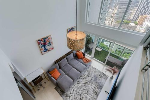 an overhead view of a living room with a couch at Brickell River Views- modern amenities in the city in Miami