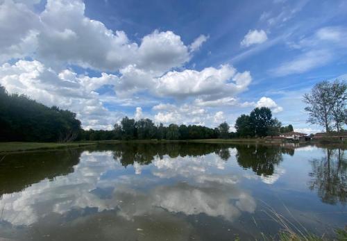 a large body of water with clouds in the sky at Agriturismo La Bisa in Trecenta