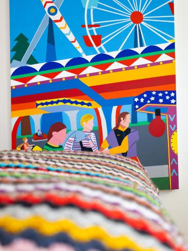 a painting of a group of people in a circus at Borgata Giostra in Caprie
