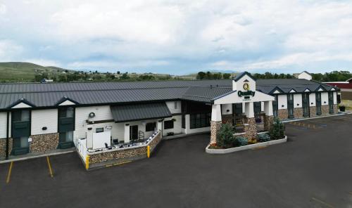 an overhead view of a building with a parking lot at Quality Inn Dillon I-15 in Dillon