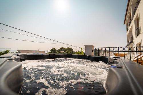 a large pool of water in the middle of a building at Villa Mianka Rab in Banjol