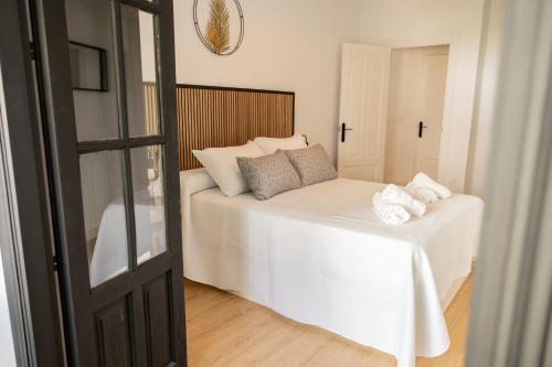 Ένα ή περισσότερα κρεβάτια σε δωμάτιο στο Apartamento La Brisa, relax y naturaleza