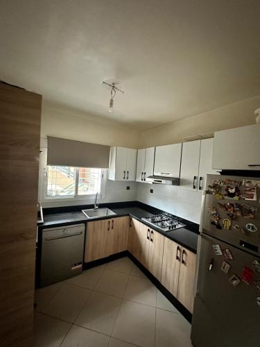 Η κουζίνα ή μικρή κουζίνα στο Seaside Apartment in Harhoura