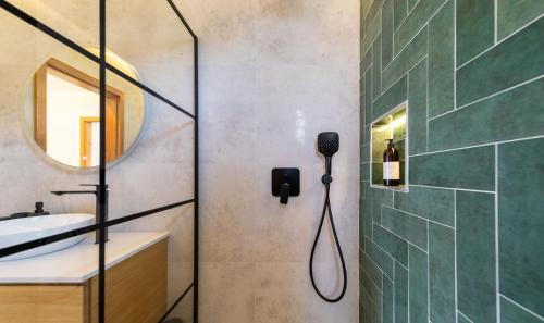 a bathroom with a shower and a sink at Villa Mianka Rab in Banjol