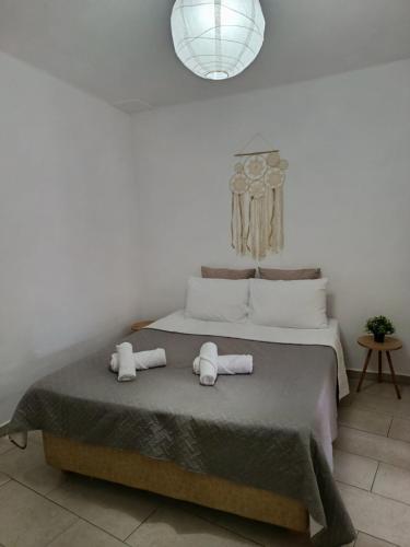 Ένα ή περισσότερα κρεβάτια σε δωμάτιο στο Cozy apartment near the center