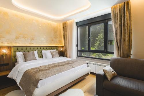 Un ou plusieurs lits dans un hébergement de l'établissement Hotel Rezident
