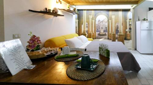a living room with a couch and a table at Figli Di Agata in Catania