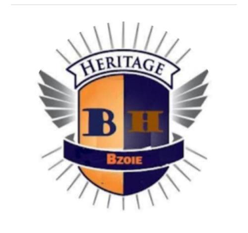 a logo for the heritage basketball team at Bzoie Heritage in Dehradun
