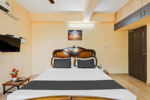 TV a/nebo společenská místnost v ubytování Super Hotel O Velachery Near Devi Karumariamman Nagar Extension