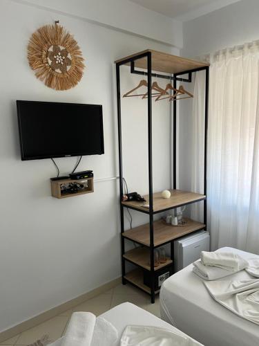 Ein Bett oder Betten in einem Zimmer der Unterkunft Helios Rooms