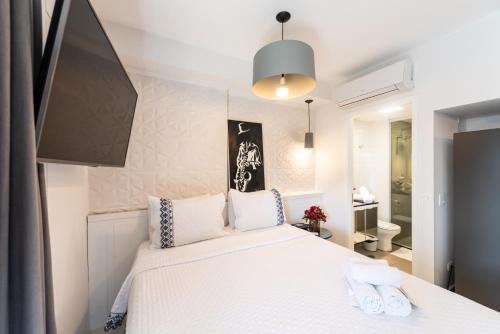 Postel nebo postele na pokoji v ubytování Rosemari's Apartments RP Deluxe Living