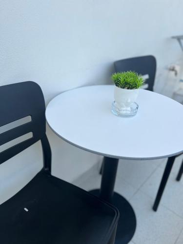 Ein Sitzbereich in der Unterkunft Helios Rooms