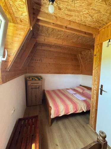 Postel nebo postele na pokoji v ubytování Guesthouse Nedajno